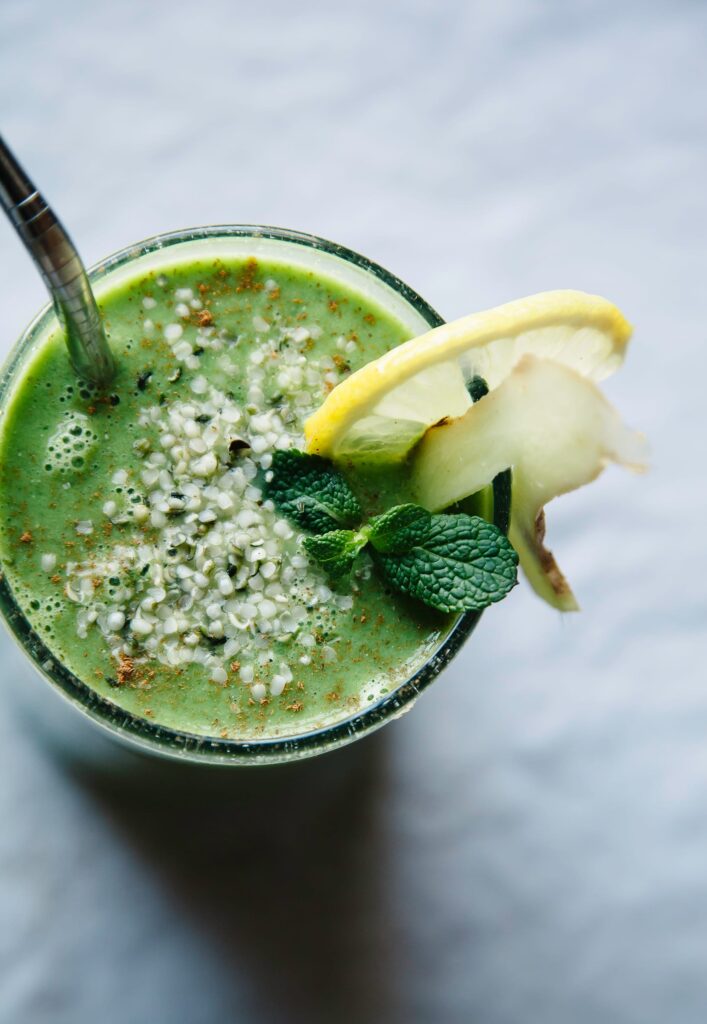 Nutrient-rich green smoothie with hemp seeds, representing a healthy dietary choice